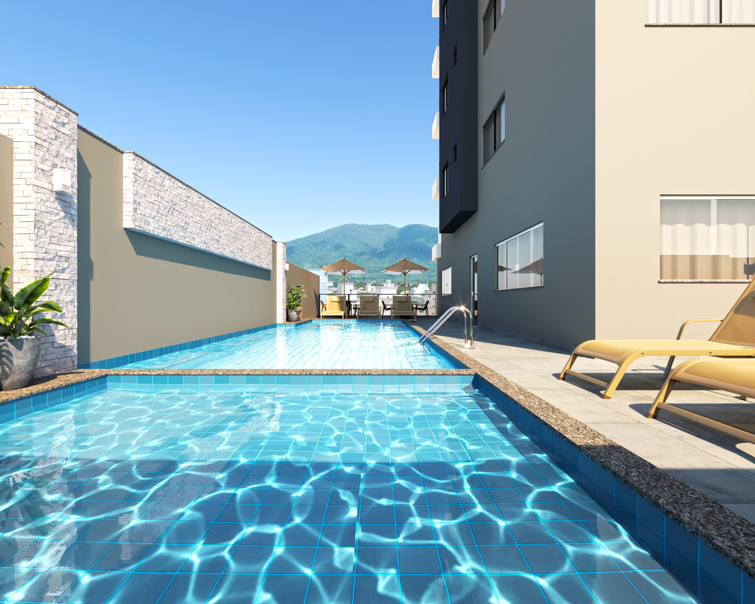 Piscina do Paradise Residence com espreguiçadeiras e vista para as montanhas
